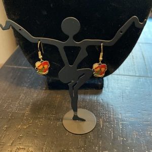 Cute gold earrings with caroling kids